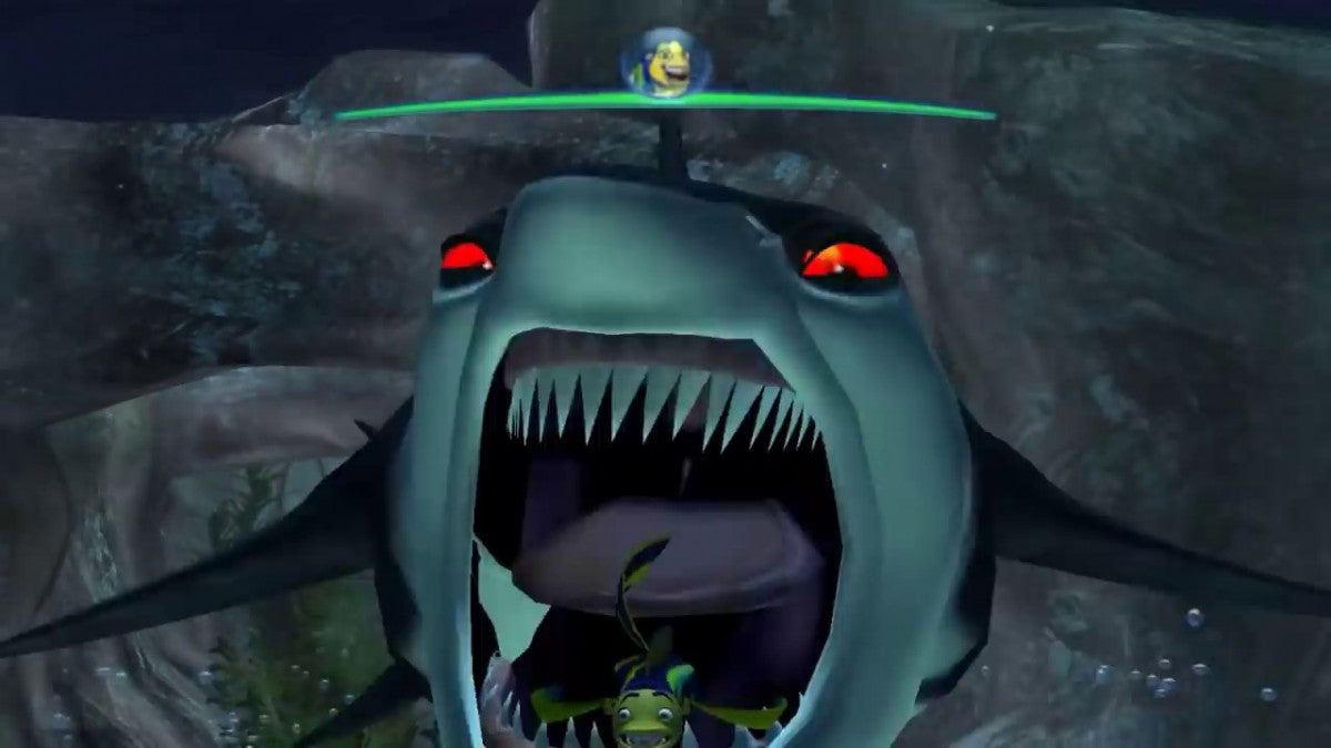 Shark Tale disc for the PlayStation 2 featuring action adventure gameplay based on the DreamWorks film with underwater missions mini games and story driven levels starring Oscar and friends in Reef City gameplay  