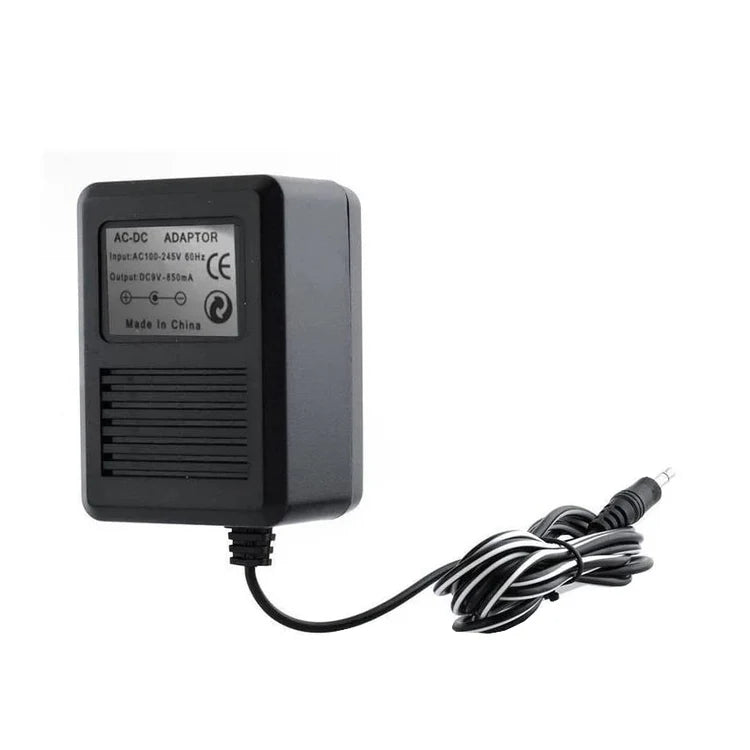 Atari 2600 power adapter close up with wall plug and cable for retro gaming console
