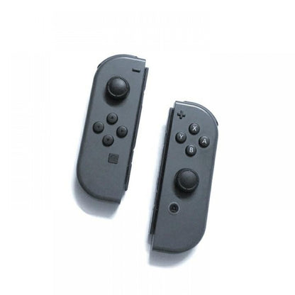 Joy-Con Gray Official Loose controller featuring wireless motion controls, HD rumble, and Nintendo Switch compatibility promotional diagonal form
