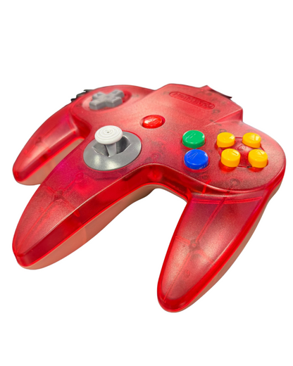 Top view of clear and red Nintendo 64 controller showing buttons and joystick