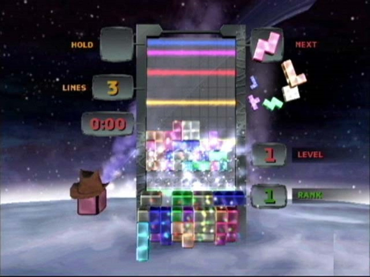 Tetris Worlds PS2 Sony PlayStation 2 puzzle game block stacking falling tetromino shapes classic arcade puzzle gameplay single player multiplayer modes high score challenge Atari Tetris franchise retro gaming PlayStation 2 software video game title gameplay