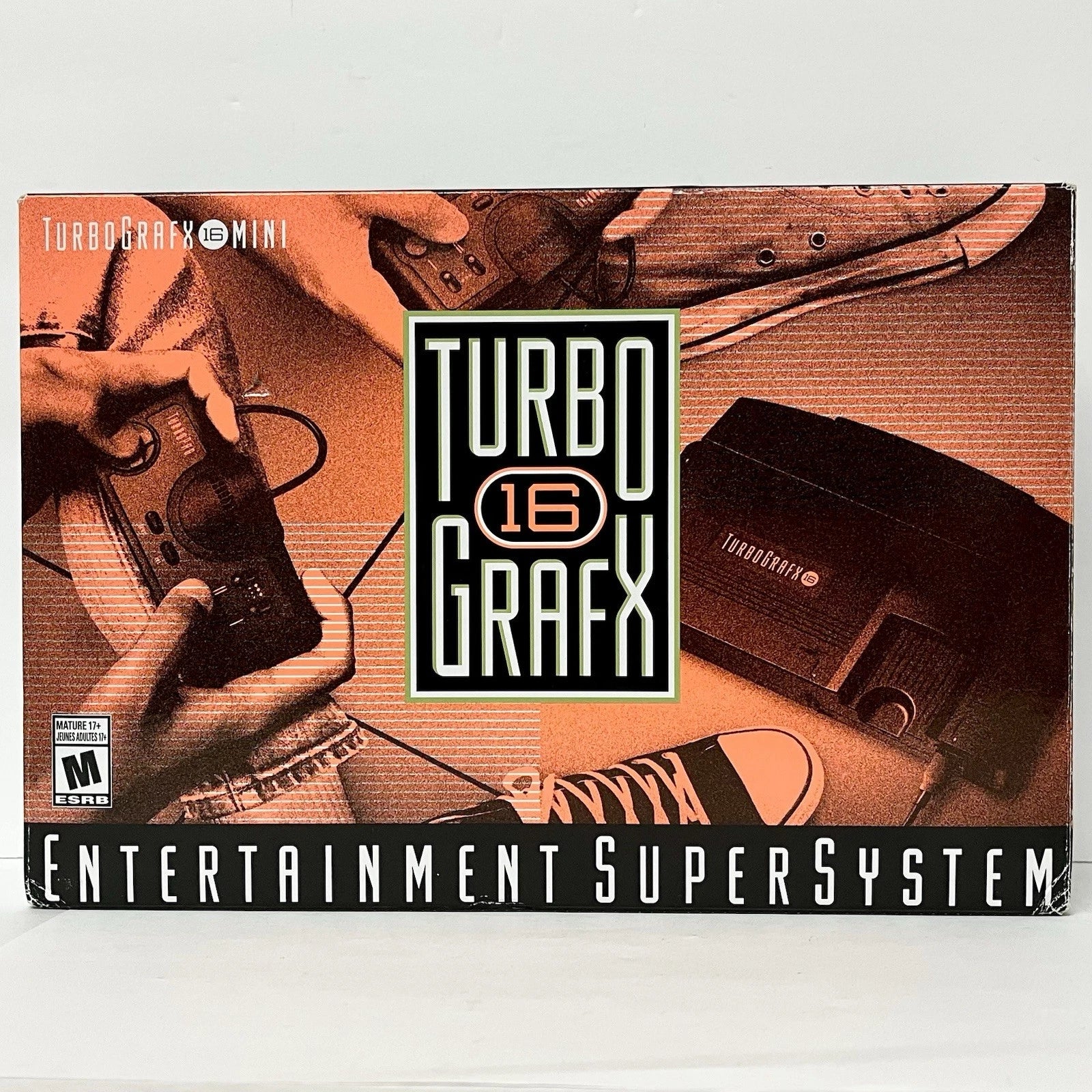 TurboGrafx-16 System (TG16) with Turbo Booster featuring NEC’s 16 bit era console for HuCard games paired with the Turbo Booster add on for composite A V output and system expansion; enjoy classic arcade style action and shooters with the enhanced setup for playing on modern TVs front box