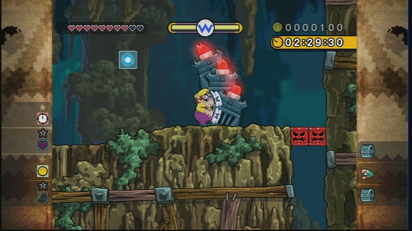 Wario Land: Shake It gameplay for Nintendo Wii (Wii) featuring side‑scrolling platform action with hand‑drawn animation, treasure hunting, and motion‑controlled shaking mechanics.