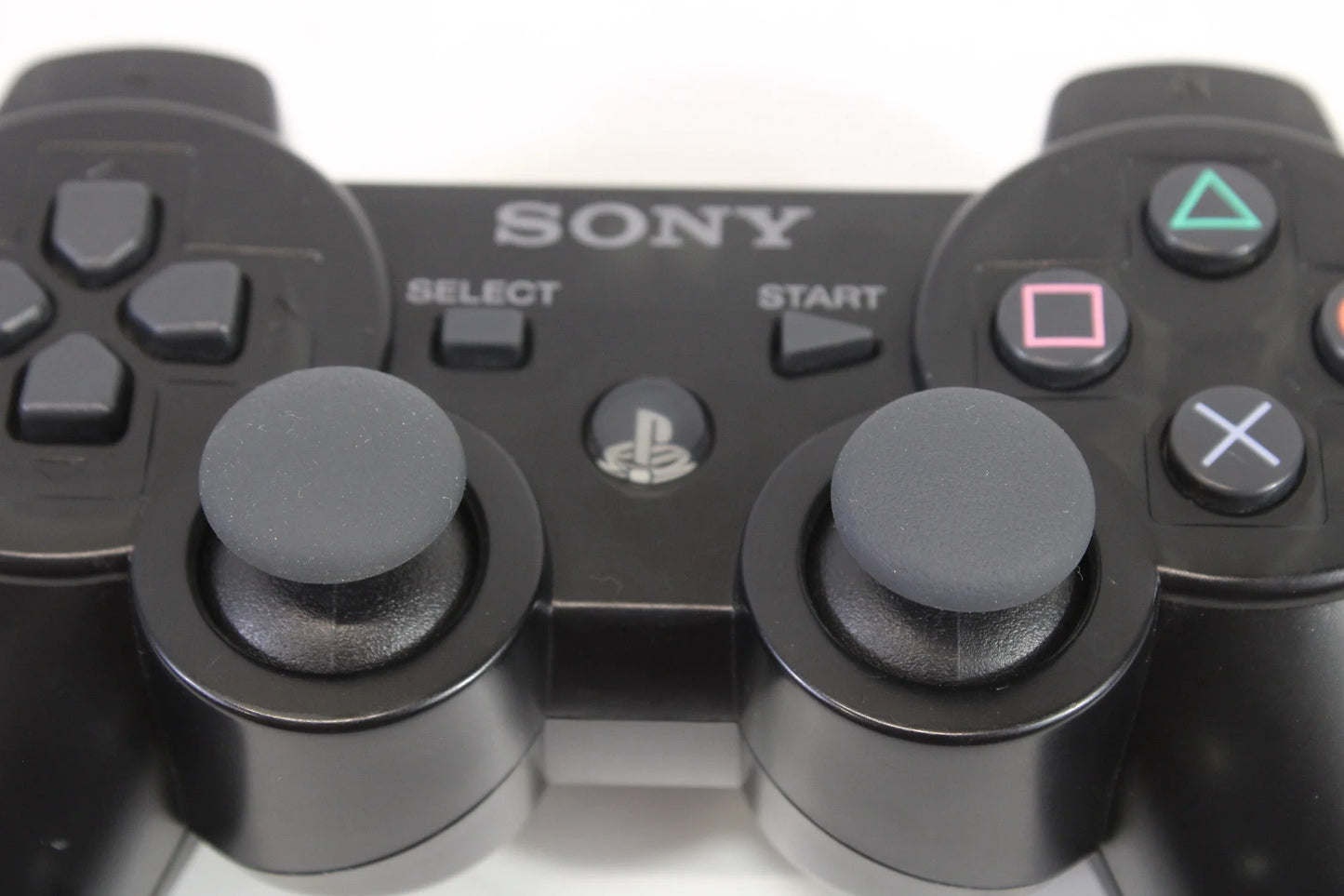 PlayStation 3 DualShock 3 OEM Black accessory PlayStation 3 (PS3) close up of sticks