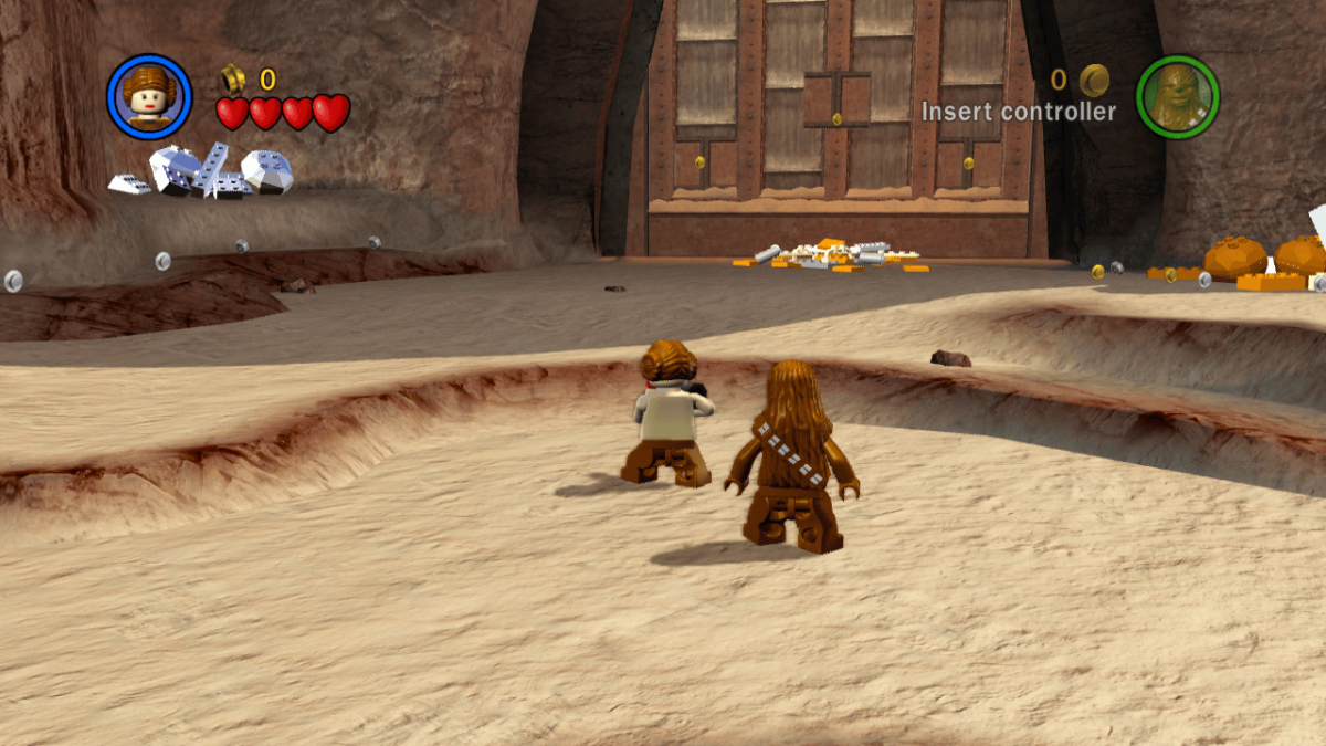LEGO Star Wars The Complete Saga game featuring action adventure gameplay with LEGO style humor covering Episodes I through VI with character switching puzzle solving cooperative multiplayer and exploration across iconic Star Wars locations gameplay 