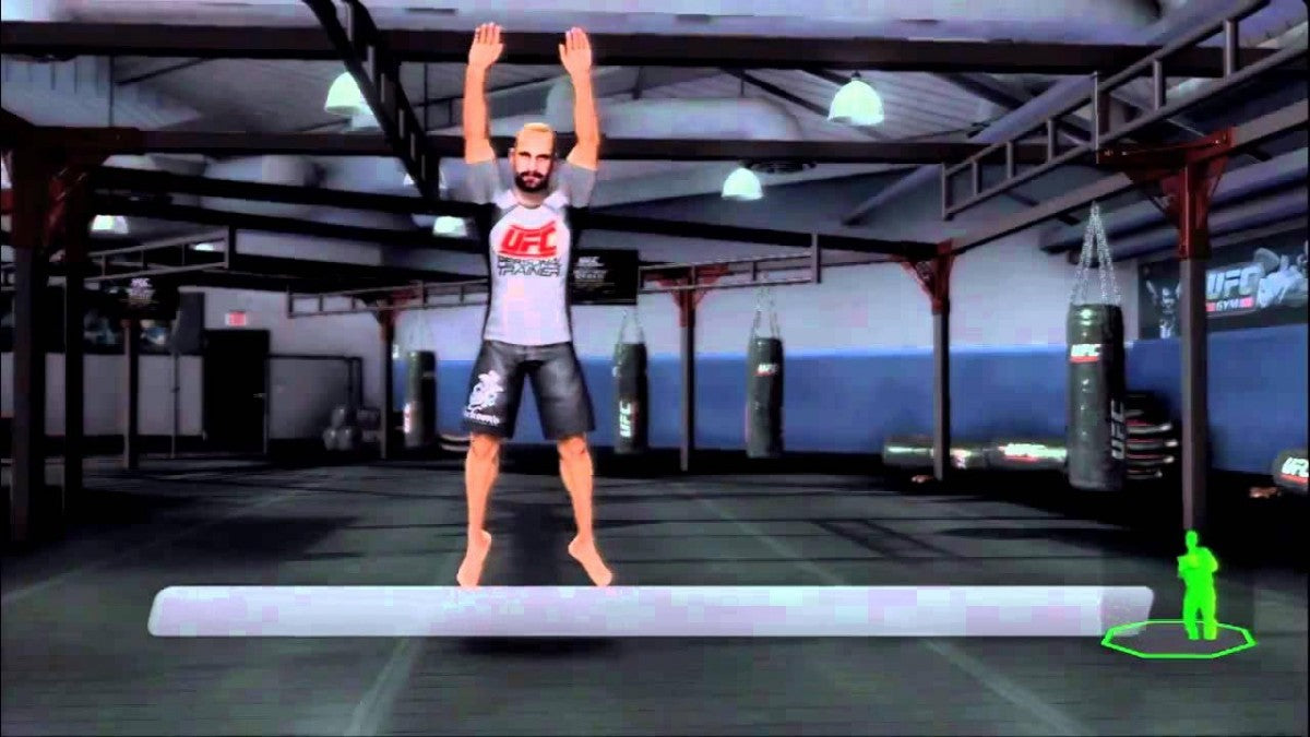 UFC Personal Trainer Platinum Hits Xbox 360 video game featuring fitness and training gameplay mixed martial arts workouts exercise routines Kinect motion control support and official UFC branded fitness title gameplay