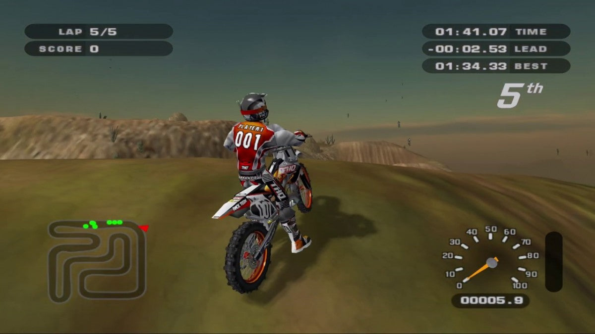 MX Unleashed Xbox off-road motocross racing video game Rainbow Studios THQ massive open environments freestyle tricks career mode nationals supercross events vehicle roster includes bikes ATVs monster trucks buggies golf carts stunt challenges track editor progressive difficulty realistic terrain physics dirt bike customization competitive AI multiple racing disciplines gameplay screenshot