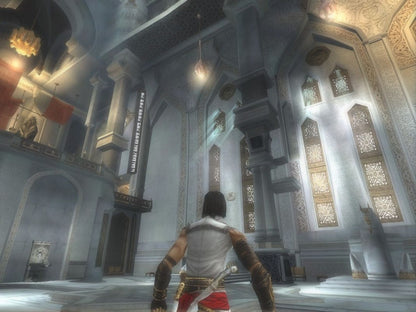 Prince of Persia The Two Thrones Nintendo GameCube game featuring action adventure gameplay with dual wield combat stealth mechanics acrobatic platforming and a story following the Prince as he battles his dark alter ego in a war torn Babylon gameplay 