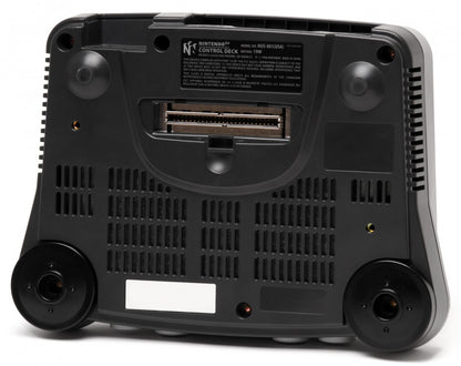 Bottom view of the Nintendo 64 console showing ventilation, screw details, and cartridge slot area