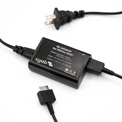 XYAB brand PlayStation Vita AC adapter and charger with USB output for powering and charging PS Vita handheld consoles