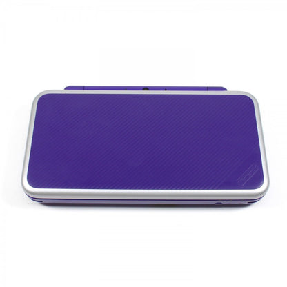 Retro Purple New Nintendo 2DS XL handheld console aesthetic featuring dual screen portable gaming system vibrant purple shell compact foldable design Nintendo handheld nostalgia collectible gaming hardware style closed view of top shell