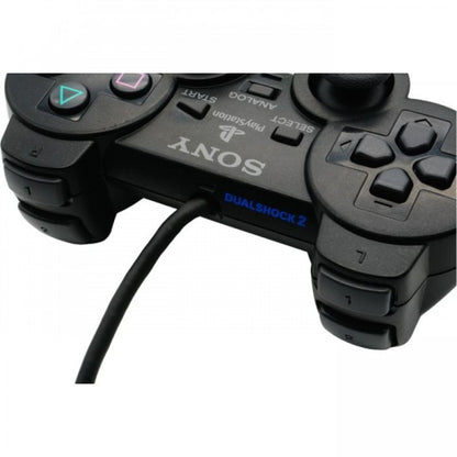 Official Sony DualShock 2 wired controller for PlayStation 2 featuring analog sticks, directional pad, four action buttons, and dual shoulder buttons