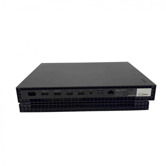 Rear view of a black Xbox One X gaming console showing HDMI ports, power input, USB ports, and ventilation grills