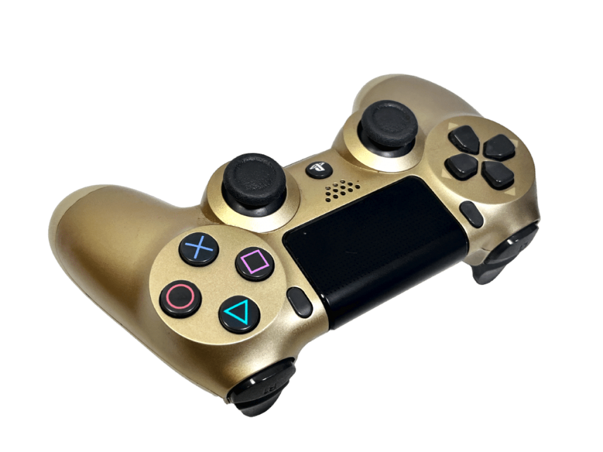 Gold Sony DualShock 4 wireless controller for PlayStation 4 featuring touchpad, light bar, and ergonomic design