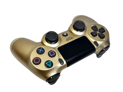 Gold Sony DualShock 4 wireless controller for PlayStation 4 featuring touchpad, light bar, and ergonomic design