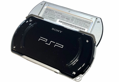 PSP Go Piano Black PlayStation Portable PSP for portable gaming fans featuring compact sliding design Piano Black finish built in controls digital game support 3.8 inch display Bluetooth wireless connectivity internal storage and sleek portable Sony gaming hardware collectible appeal back