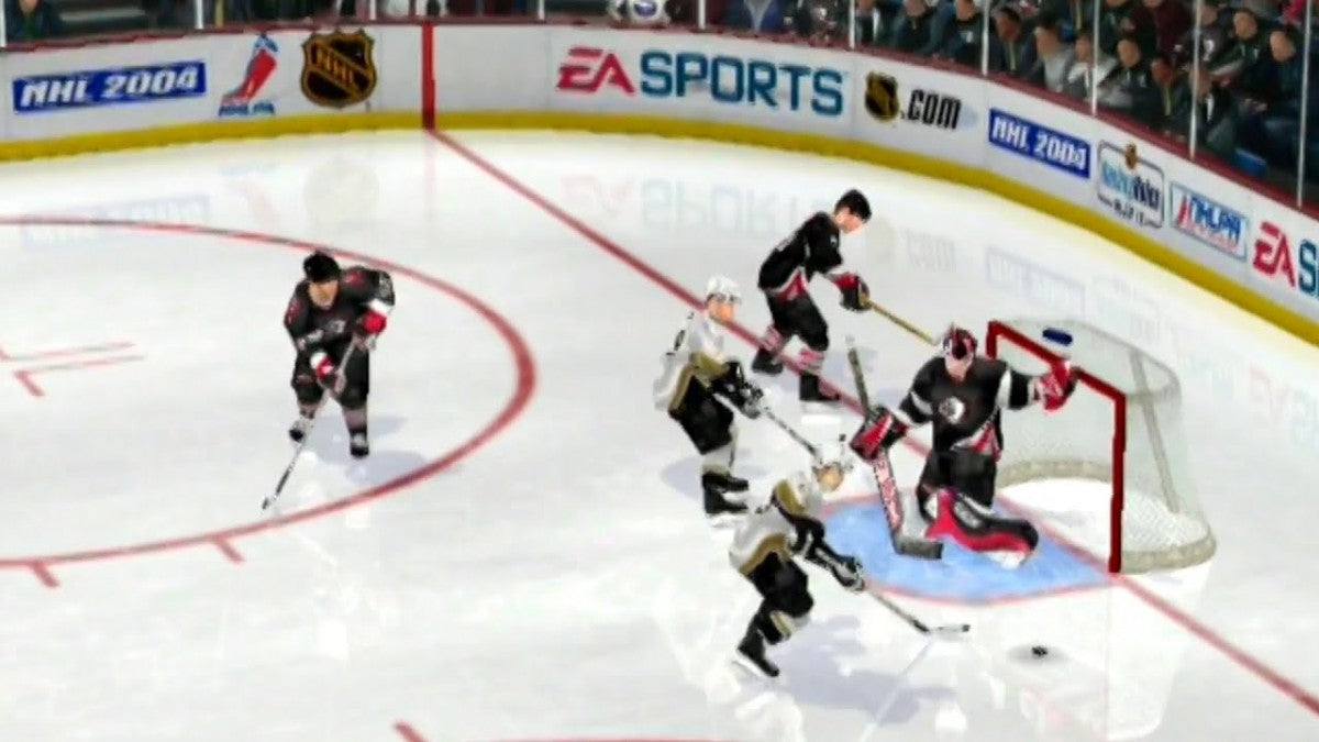 NHL 2004 PS2 Sony PlayStation 2 ice hockey sports game EA Sports NHL simulation hockey gameplay season mode franchise mode realistic skating puck physics NHL teams roster management multiplayer hockey game retro gaming PlayStation 2 software video game title gameplay