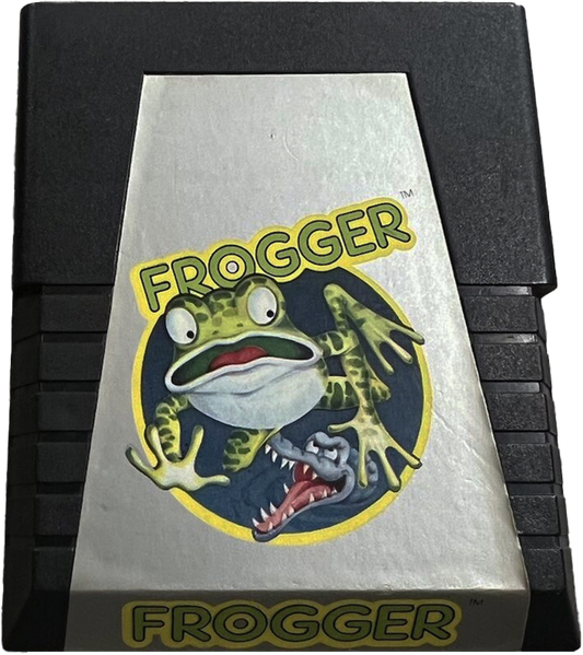 Frogger for Atari 2600, cartridge for an arcade action video game with obstacle-dodging gameplay, river crossing challenges, retro reflex-based action, and classic score-chasing fun