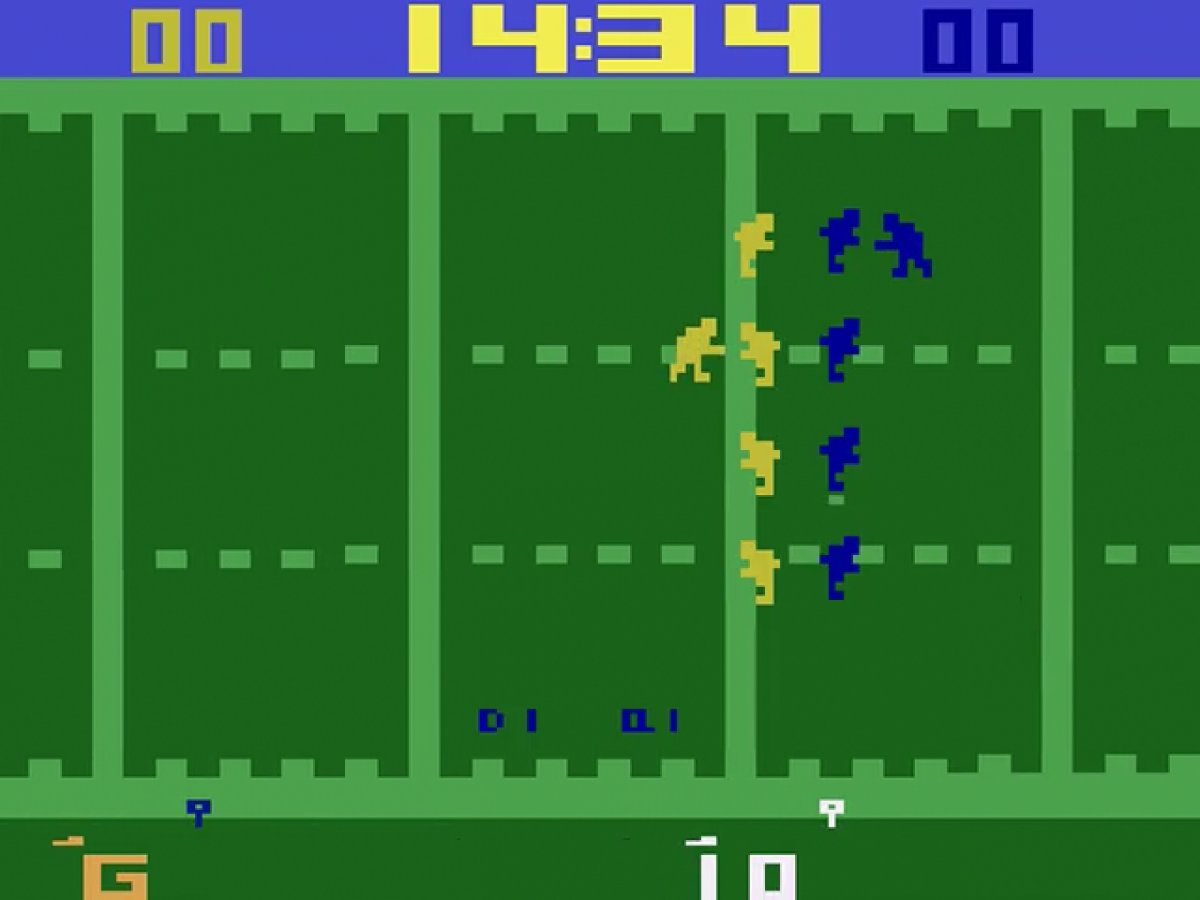 Super Challenge Football Atari inspired design featuring classic football sports gameplay aesthetic vintage gridiron action pixel graphics competitive head to head matches retro score chasing excitement early home console gaming nostalgia Atari presentation gameplay