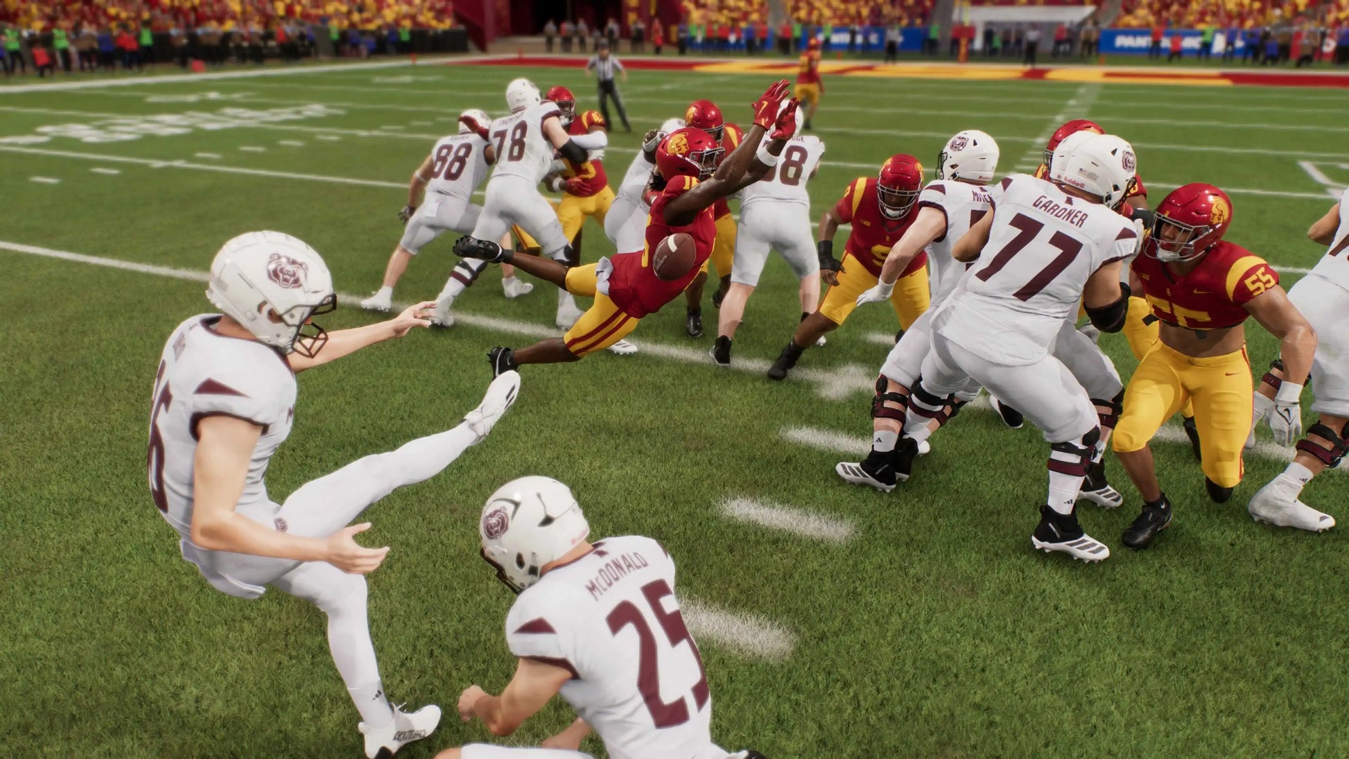 EA Sports College Football 26 PlayStation 5 college football simulation video game featuring 136 FBS schools over 300 authentic coaches 2700 new plays Dynasty Road to Glory College Ultimate Team Road to the College Football Playoff enhanced Stadium Pulse Home Field Advantage dynamic substitutions wear and tear mechanics Heisman Trophy journey recruiting portal authentic game day atmospheres fight songs commentary gameplay screenshot
