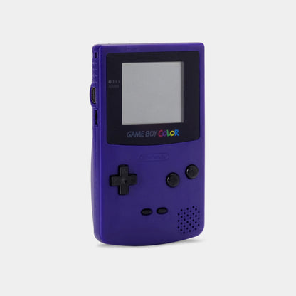 Front side view of a grape purple Nintendo Game Boy Color handheld console with screen, buttons, and speaker visible.
