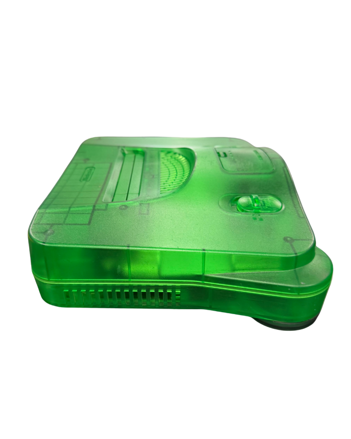 Nintendo 64 Jungle Green console featuring the translucent green clamshell design standard N64 hardware with cartridge slot, four controller ports, and compatible with classic N64 games