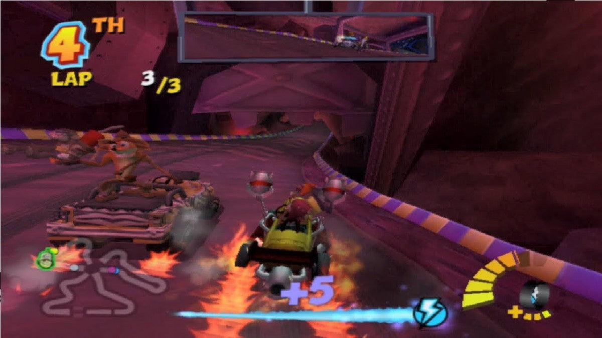 Crash Tag Team Racing for PlayStation 2 (PS2) featuring the hilarious fusion of high-speed racing and platforming adventure where you can "clash" your vehicle with an opponent's to create a powerful hybrid turret-car; explore Von Clutch's Motor World on foot, solve puzzles, and collect Power Gems in this wacky, combat-heavy twist on the Crash Bandicoot racing formula gameplay screenshot