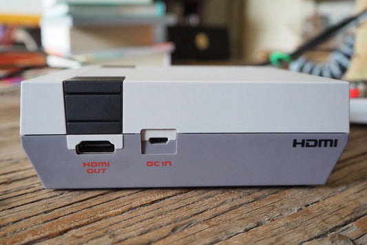 Nintendo Entertainment System Classic Edition NES Classic console featuring retro gaming design, built-in classic NES games, and included third party controller back view