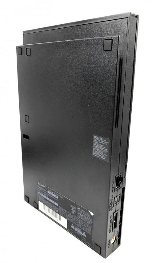 Bottom view of the PlayStation 2 Slim console standing vertically, showing console base, ventilation grilles, model information label, and support stand design for stability